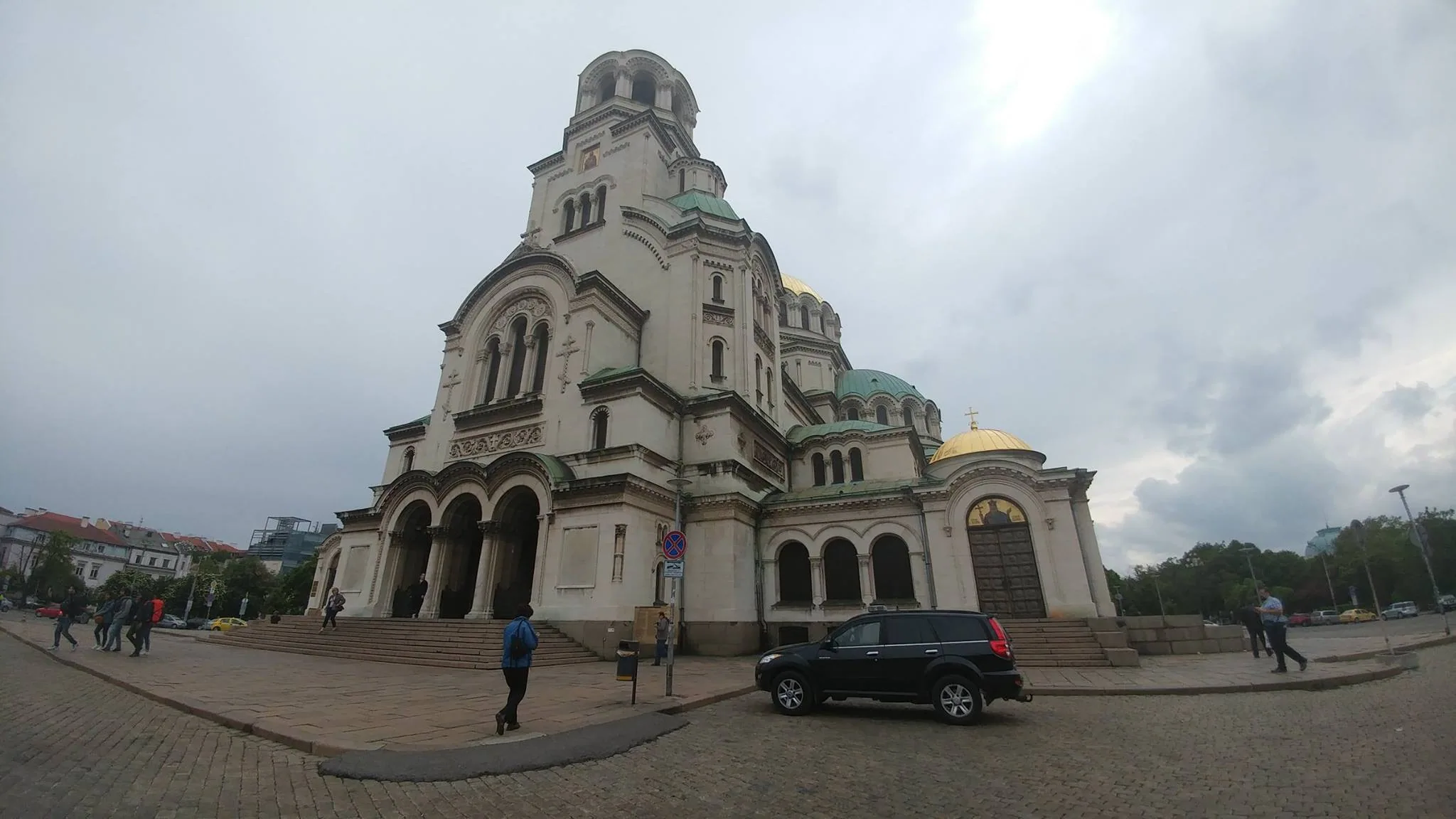 A domed cathedral beneath a cloudy Sofia sky