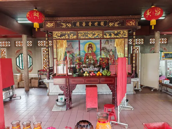 An ornate shrine with red lanterns in Penang