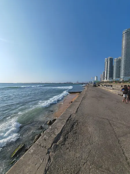 Waves beside the seafront promenade in Colombo