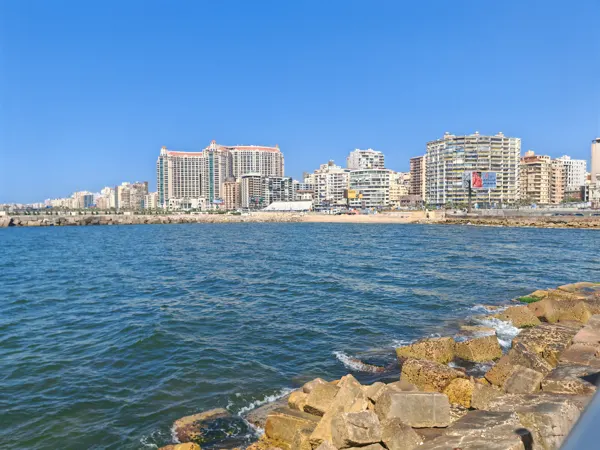 Alexandria’s waterfront buildings beyond the blue Mediterranean