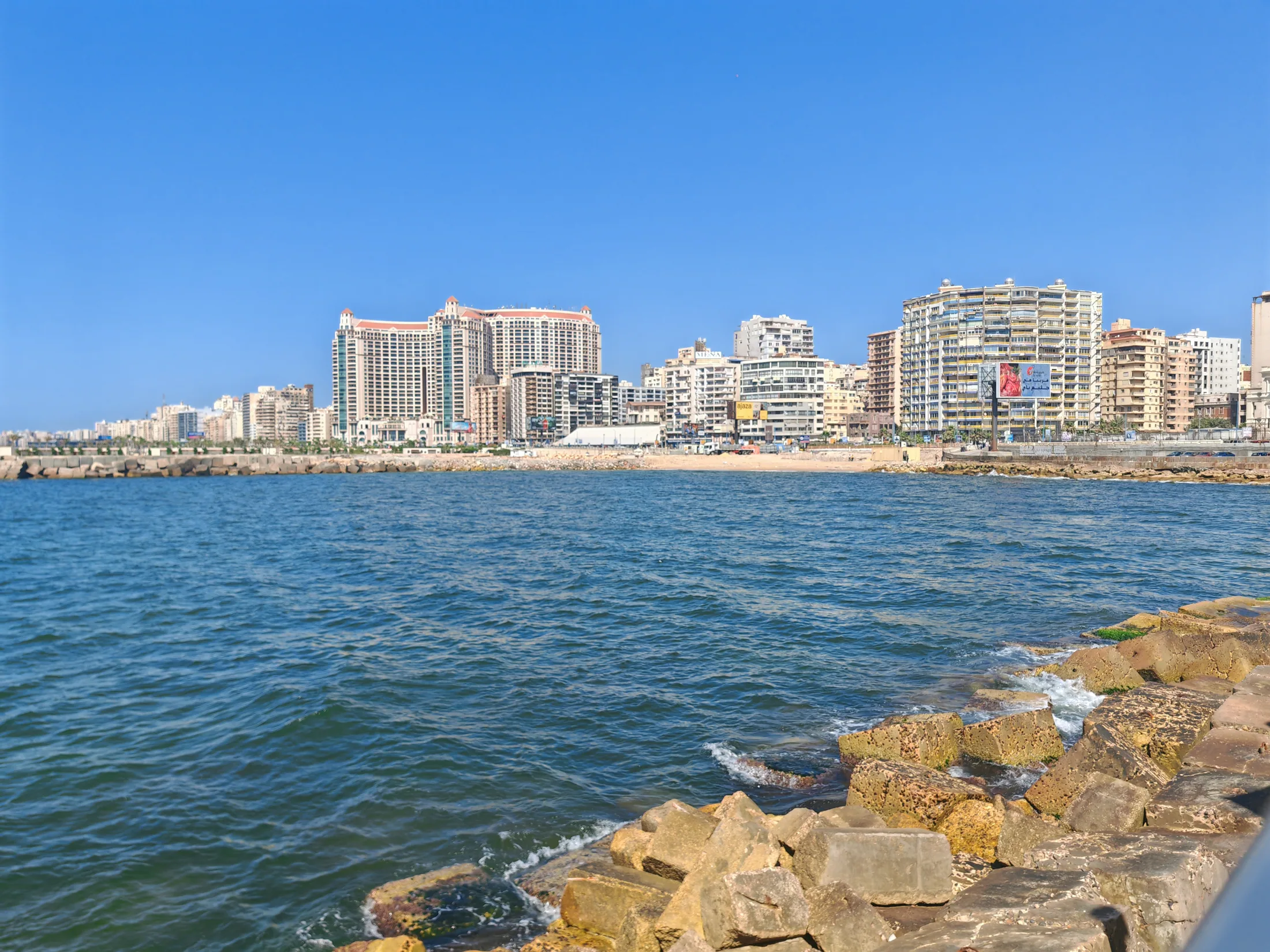Alexandria’s waterfront buildings beyond the blue Mediterranean