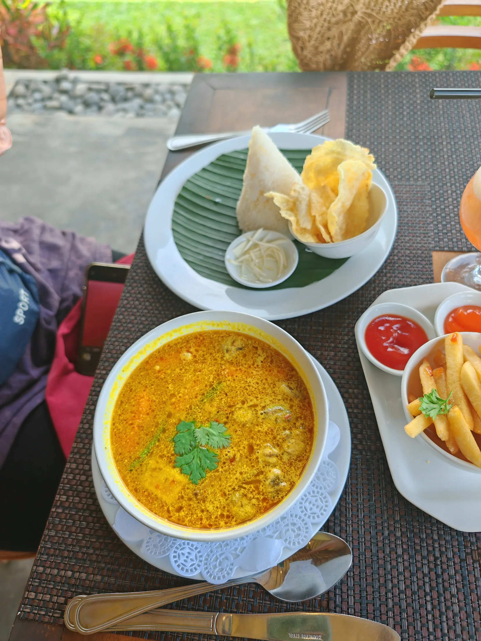 A bowl of food and fresh fruit during a stay in Ubud