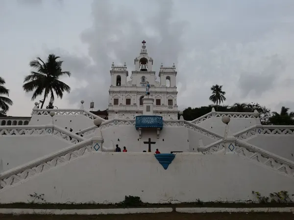 A white Goan church above broad stepped terraces
