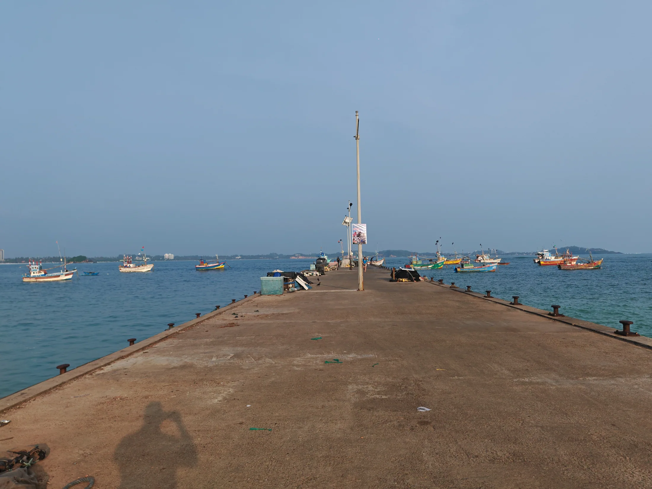 Fishing boats beside a jetty in Mirissa