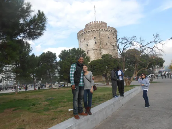Travellers beside the White Tower and its surrounding park
