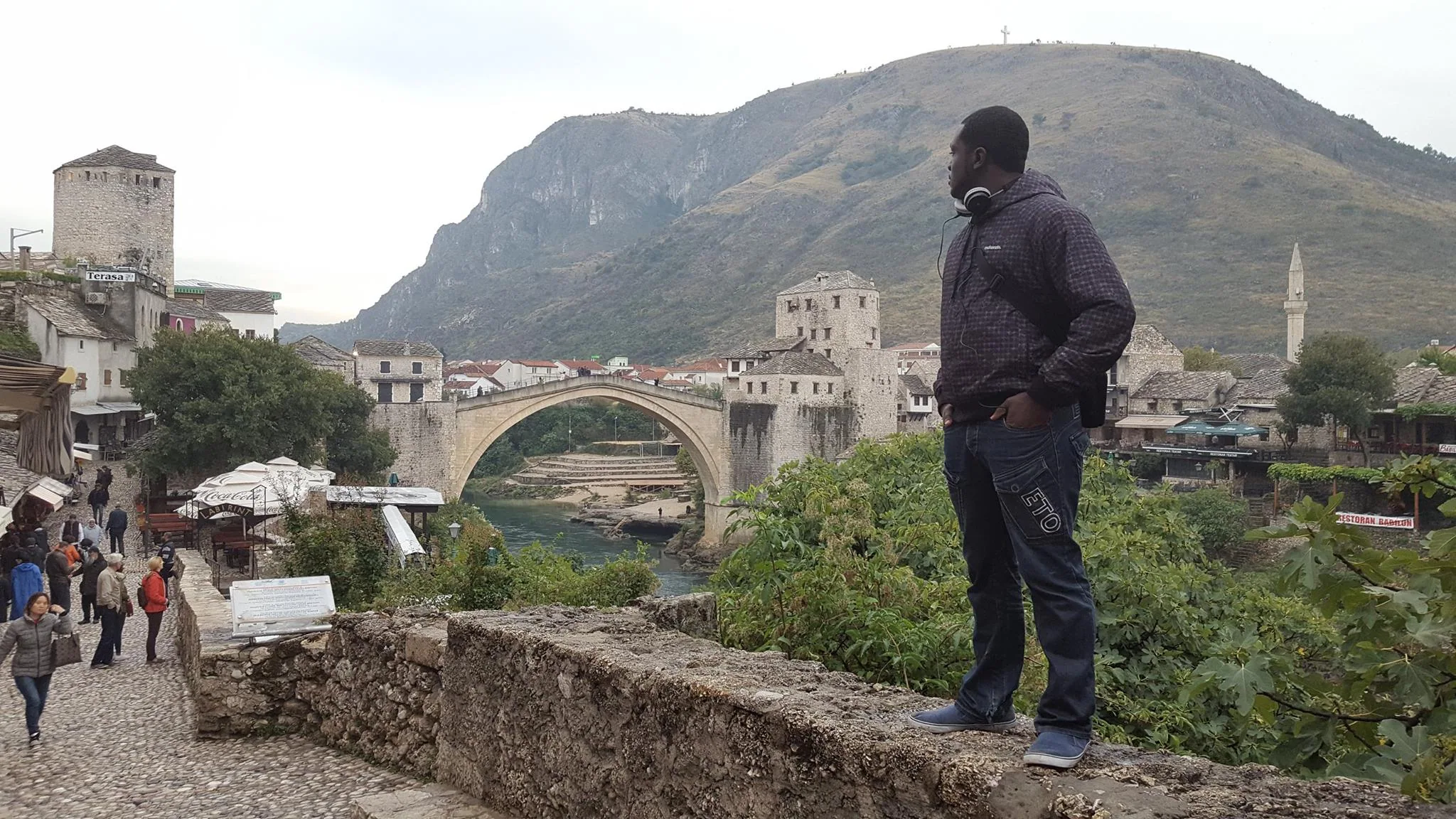 A traveller overlooking Mostar and the Old Bridge