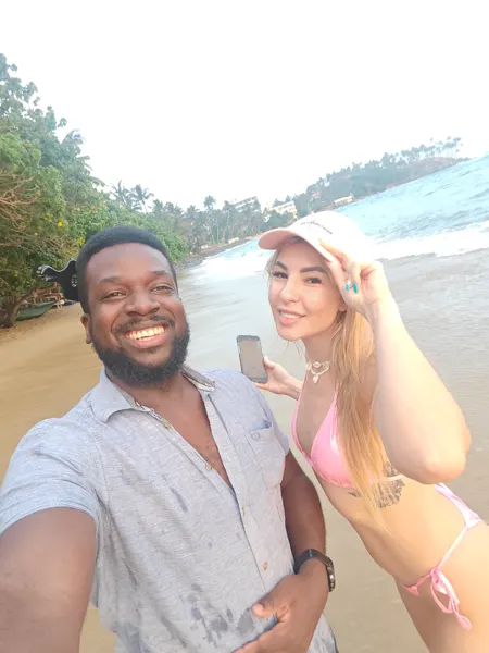 Two travellers on the beach in Mirissa