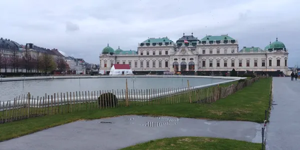 Belvedere Palace and its grounds beneath a grey Vienna sky