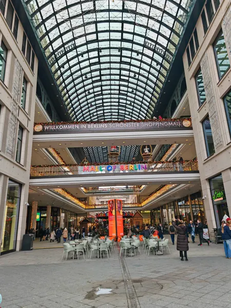 An arched glass roof over a shopping arcade in Berlin
