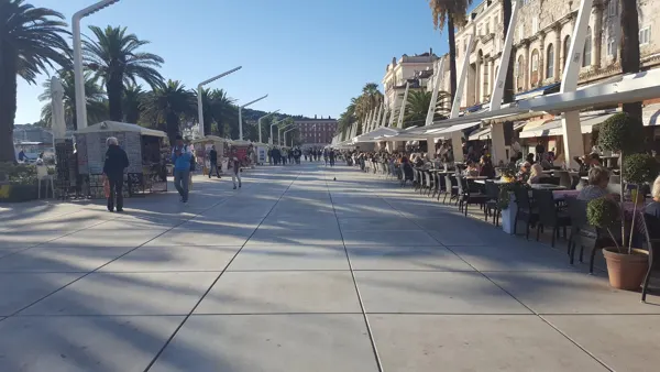 Palms and outdoor cafés along Split’s waterfront
