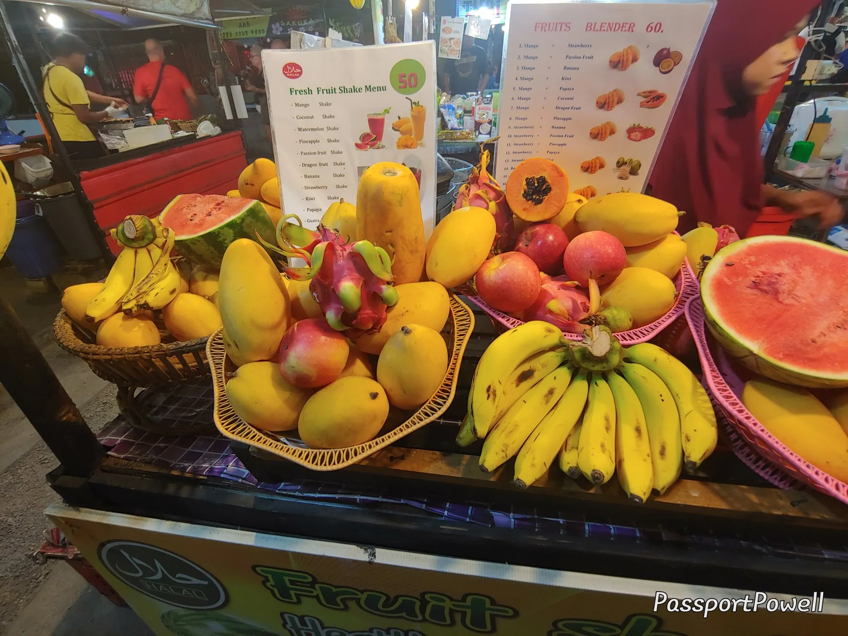 Fresh tropical fruit arranged at a market stall