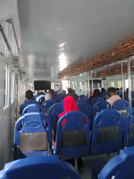 Passengers aboard the local ferry on the journey to Villingili